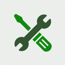 Green icon of wrench and screwdriver.
